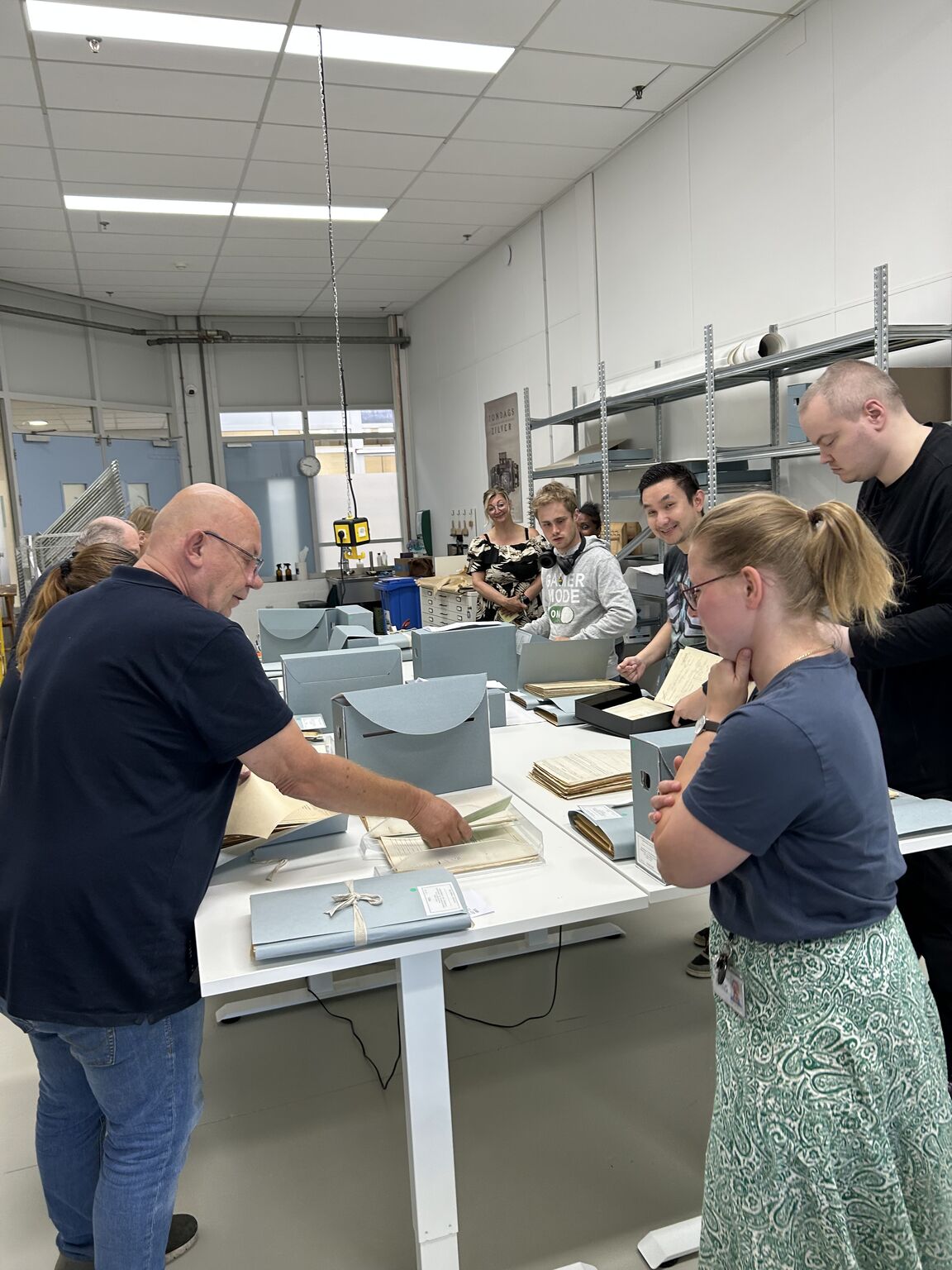 Staff taking part in practical training with original archive material through 2dA Permanent Education